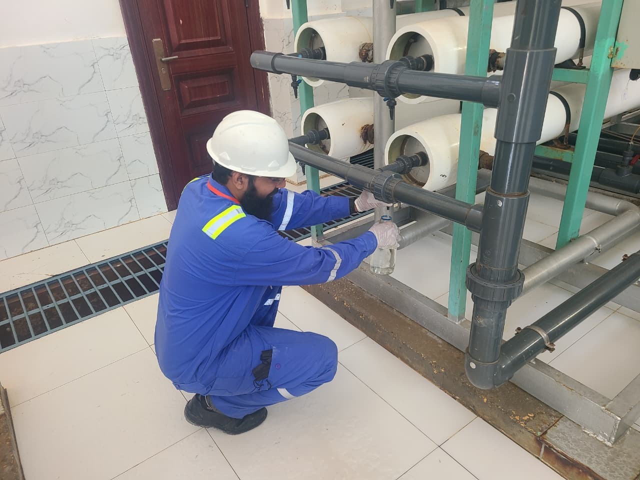 Water sampling at industrial facility