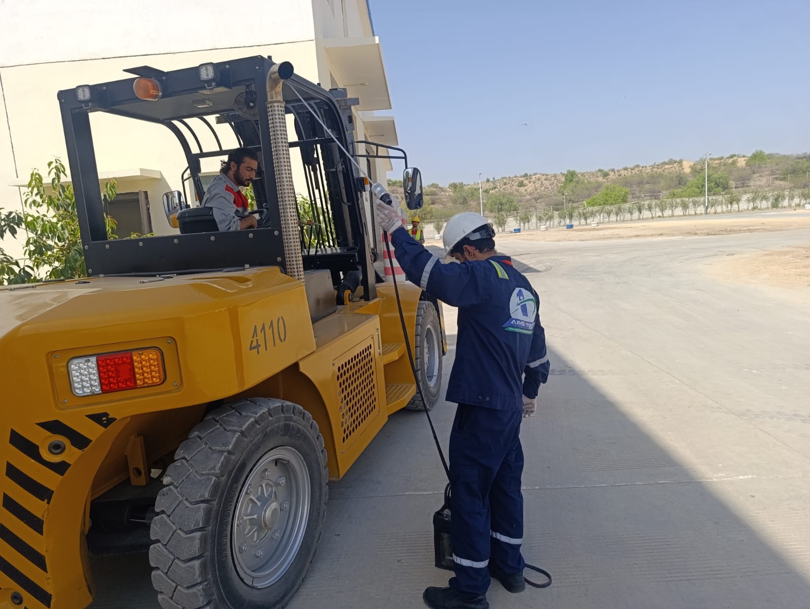 Heavy equipment inspection at industrial site